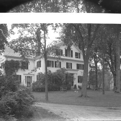 Reverse side with postcard pasted on.