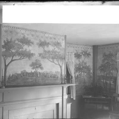 Reverse side with section of postcard pasted on.