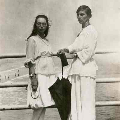 Two women standing at Old Orchard Pier