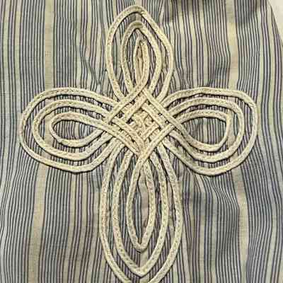 Insignia on left sleeve.