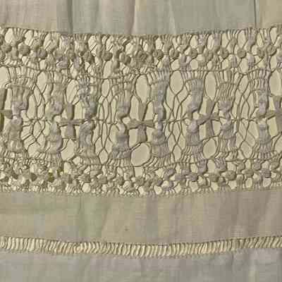 Detail of drawn work on skirt