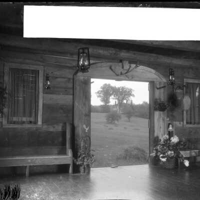 Reverse side with postcard section pasted on.