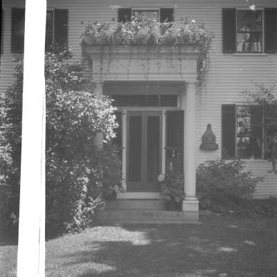 Reverse side with postcard section pasted on.