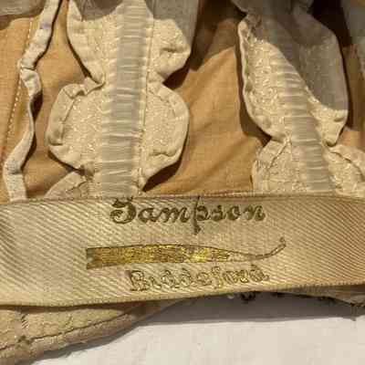 Label inside bodice.