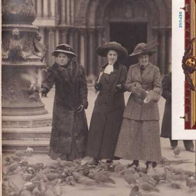 Three of the party feeding pigeons in the Piazza San Marco, Venice.: The three ladies appear to be about the same age, so presumably the photograph was taken by Luella Frey.