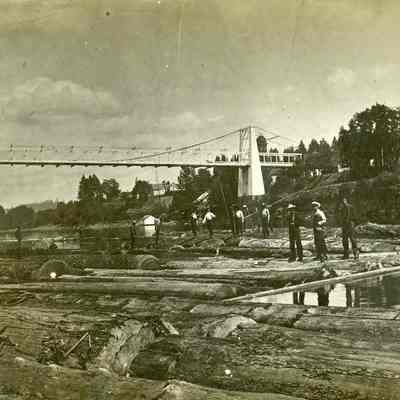 Log Booms under Oregon City-West Linn Suspension Bridge.