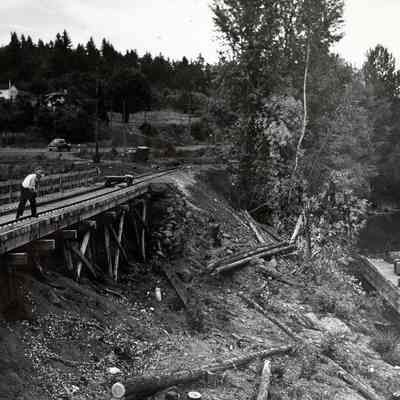 Floating Crane in River and Railroad Tracks