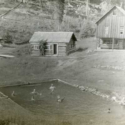 Wooden Buildings with Swimming Hole