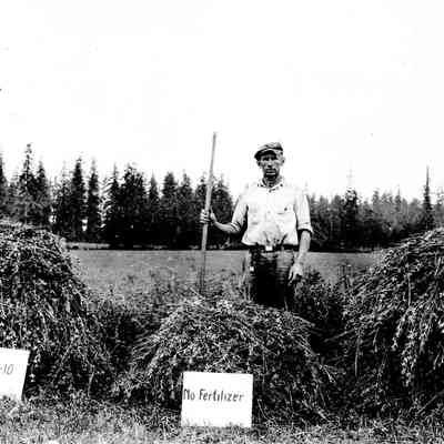 Upper Logan 1928 - Henry and George Kohl Testing Fertilizer