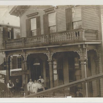 Bridge Hotel - or whichever name from which it operated at the time of this photograph. Room and board Seventh Street at the bridge. Oregon City