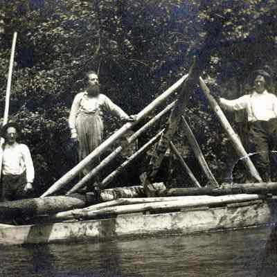 Log Raft Structure with Three Men