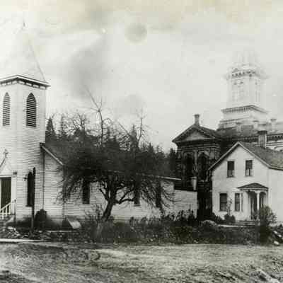 Oregon City St. Paul's Episcopal Church, first building and rectory, 9th and Water Street (McLoughlin Blvd.). Reverend P.K. Hammond
