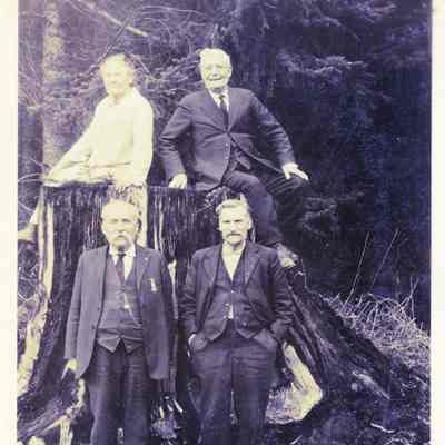 Emma Talbert, Unidentified man, Joe and Jehu Davis (standing)