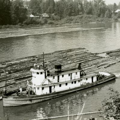 Tugboat "Chief" with log raft on the Willamette River Oregon