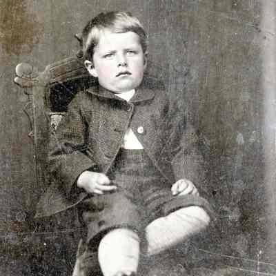 Unknown Young Boy Portrait Sitting in Chair