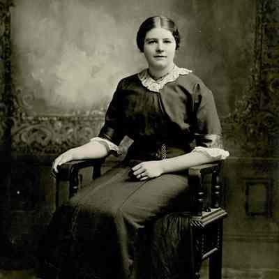 Eggimann Family Photo Collection - Portrait of a Young Woman Seated