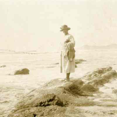 Lady on the Coastal Rocks -Talbert Collection