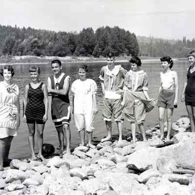 Unknown Young People - On Rocky Beach in Various Styles of Swimsuits