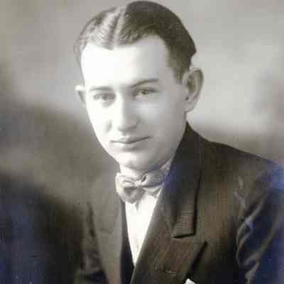 Unknown Man Wearing Suit and Bow Tie