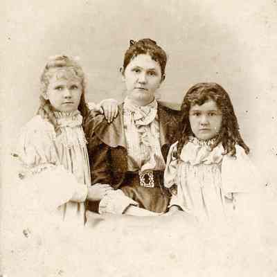 Seated Woman with Two Girls Portrait