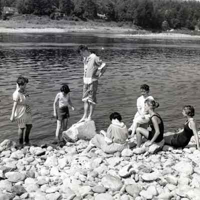 Unknown Young People - On Rocky Beach in Various Styles of Swimsuits
