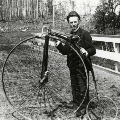 Man with High wheel bicycle