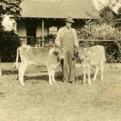 Unidentified Man with Calves and Chickens - Talbert Collection