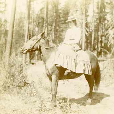 Unknown Woman Riding Sidesaddle on a Horse