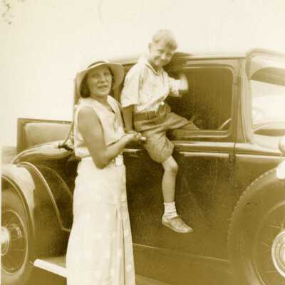 Woman, boy and automobile