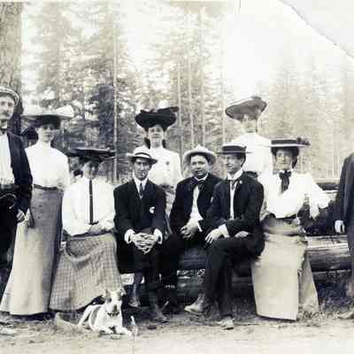 Ed Carr Collection - Group posing by some Logs
