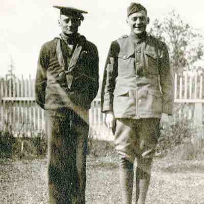 Two (2) Unidentified Service Men