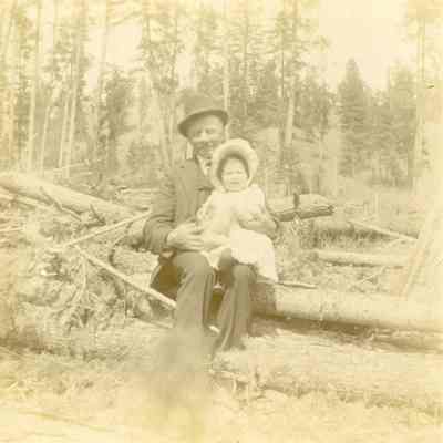 Unidentified Man holding a Child - Talbert Collection