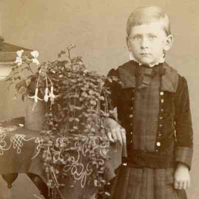 Unknown Boy in Kilt with Dog Portrait