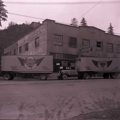 Logan Chevrolet with Ewen Freight Lines trucks - November 1933 - Negative - 1024 Main Street