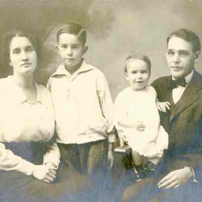 Alldridge Family - Man and Woman with two Children