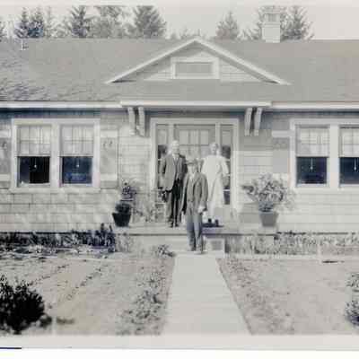 Three (3) Unidentified People in front of a house - Talbert Collection