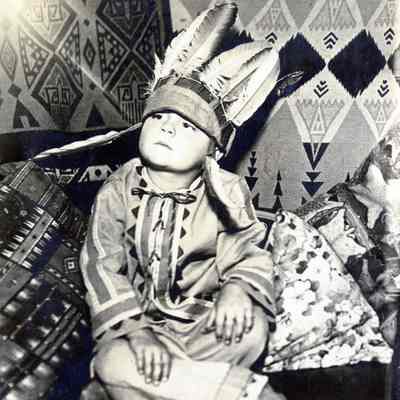Unknown Child - Native American Clothes with Headdress