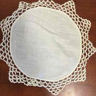 Circular white cloth with trim/Marrs-Curry/Unknown Provenance