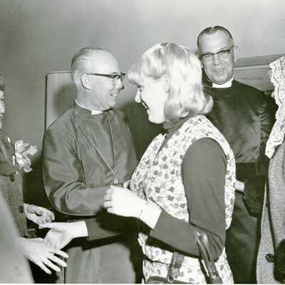 Two Ministers in a Social Setting.