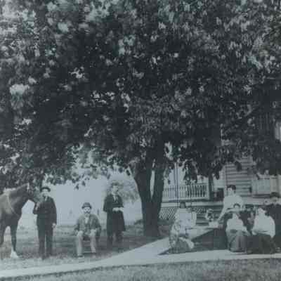 Cross, Judge Harvey and Family in Front of Home - 1895
