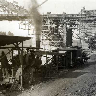 Steam Tractor at Construction of Arch Bridge. Ralph Eddy Photo.: Origsize: 3" x 5"; Origformat: Print-Photographic