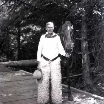 Mr. Albie and a favorite horse at Boy Scout Camp Merriwether, Oregon - Negative