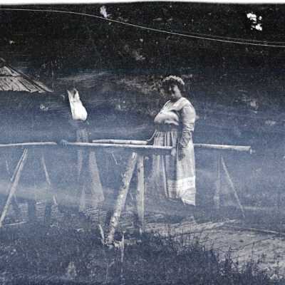 Woman on bridge (Camp Adams), 1915-1935.: Origformat: Negative