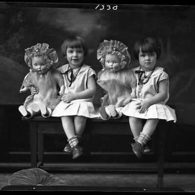 Photograph of twin girls with twin dolls for F.H. Wallace - December 1929 - Negative