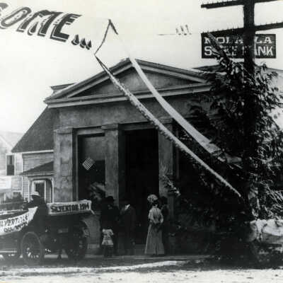 Welcome to Molalla and Its First Electric Train. 1913: Copyright: None; Origsize: 8" x 10"; Origformat: Print-Photographic