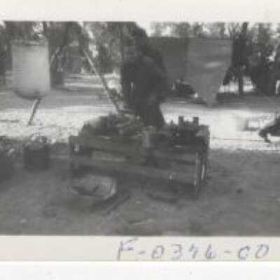 Unknown Man standing by Box at Fort lewis Washington - no Date