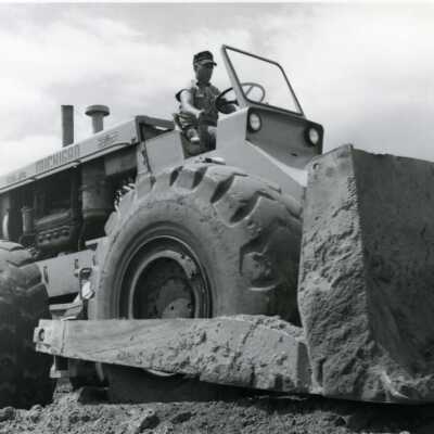 Man on Earth Mover, I-205 Bridge Construction.