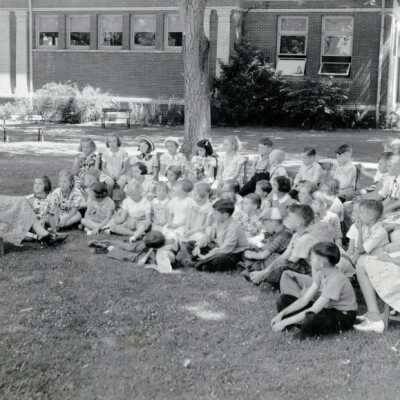 Story Hour on Library Lawn, Summer 1938.: Copyright: None; Origsize: 6" x 8"; Origformat: Print-Photographic