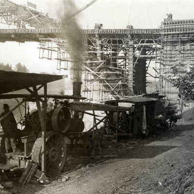 Steam Tractor at Construction of Arch Bridge.