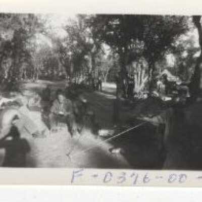 Fort Lewis - Two Unknown Men Sitting in the Road